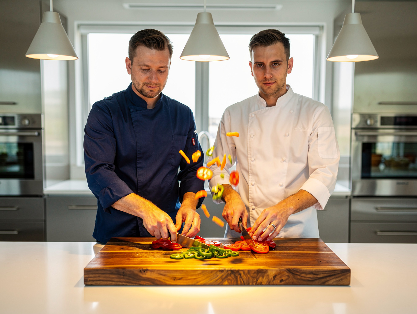 Chef preparing fresh seasonal ingredients in kitchen