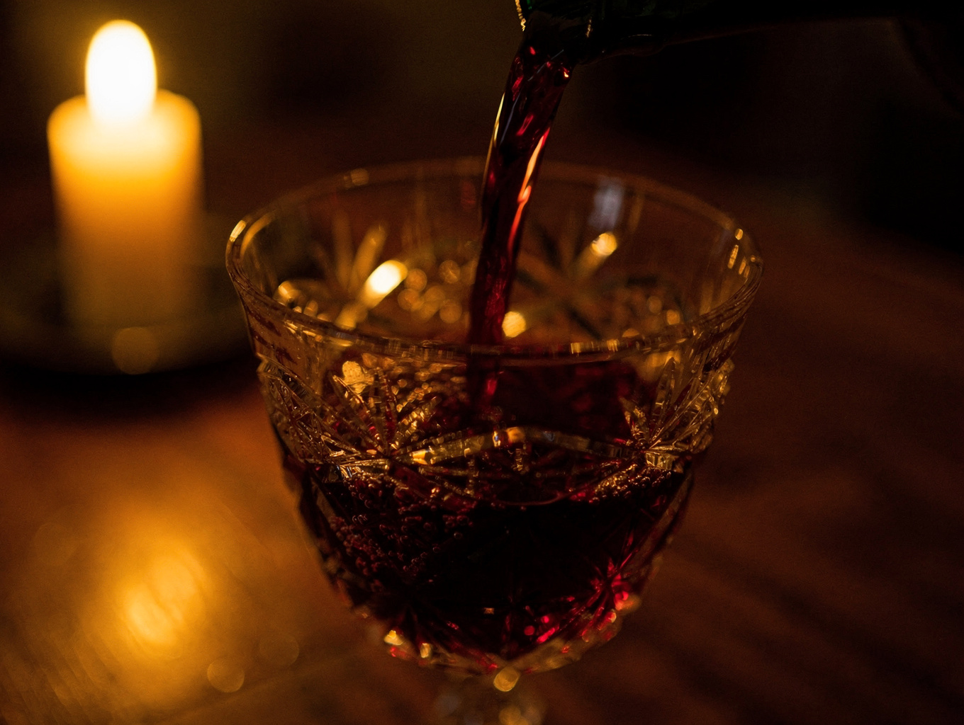 Glass of deep red wine with dark fruit notes